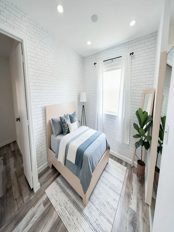 Empty room before and after an AI Scandinavian bedroom redesign with white and dusty blue bedding